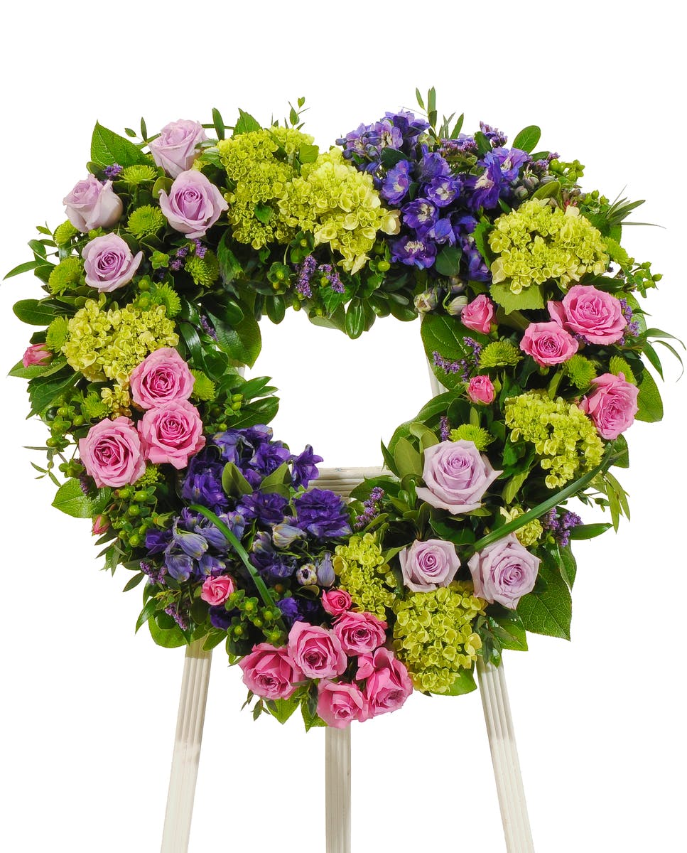 Bold Spring Heart Stand Sympathy arrangement delivered in Baton Rouge