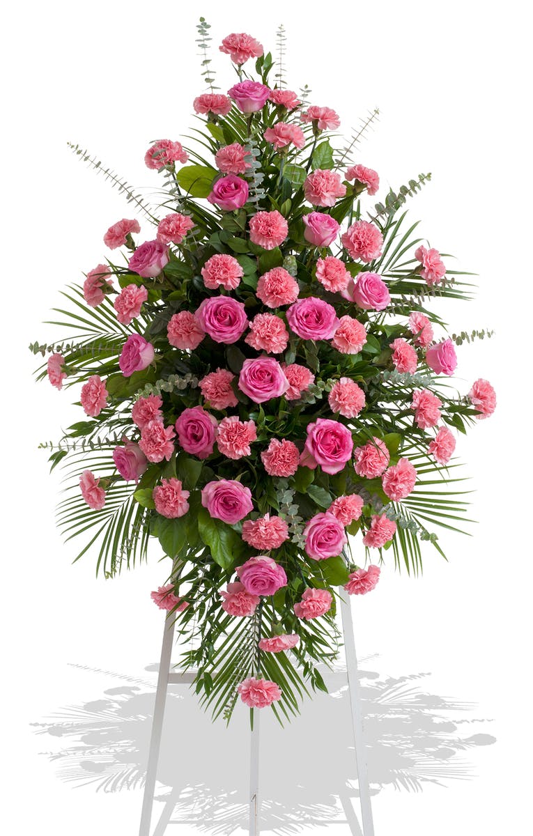 Roses and Carnations Traditional Standing spray delivered in Baton