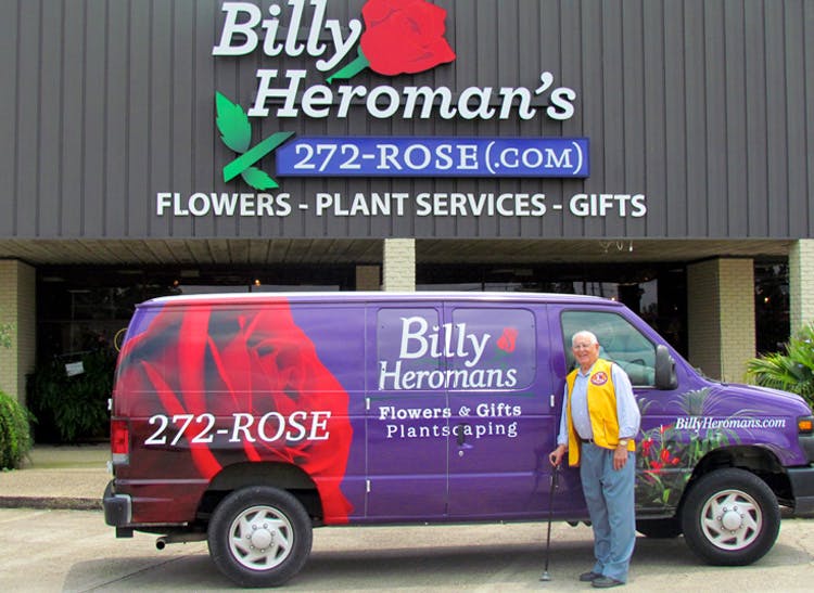 Billy poses with a wrapped delivery van outside our Baton Rouge location
